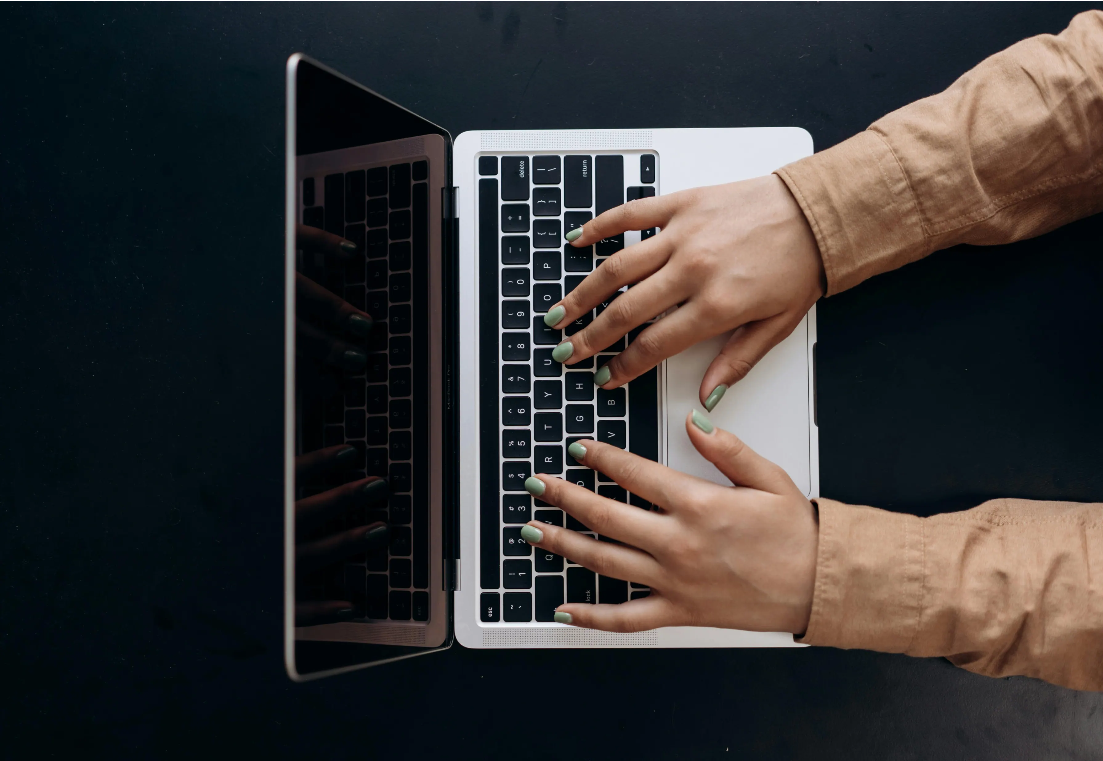 Designer making a design using a laptop